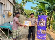 Sambut HUT Humas Polri, Polres Buol Salurkan Bansos untuk Warga Leok II dan Kulango